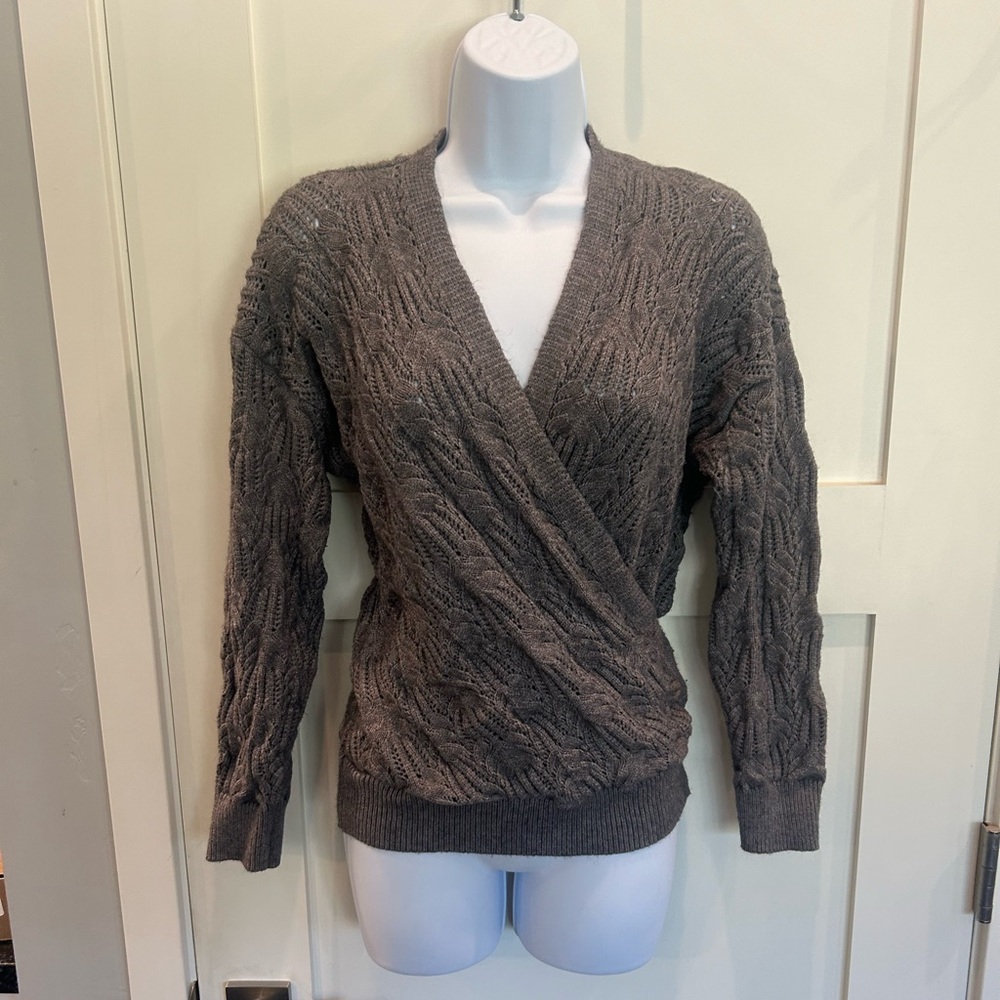 Grey knit sweater with front wrap look